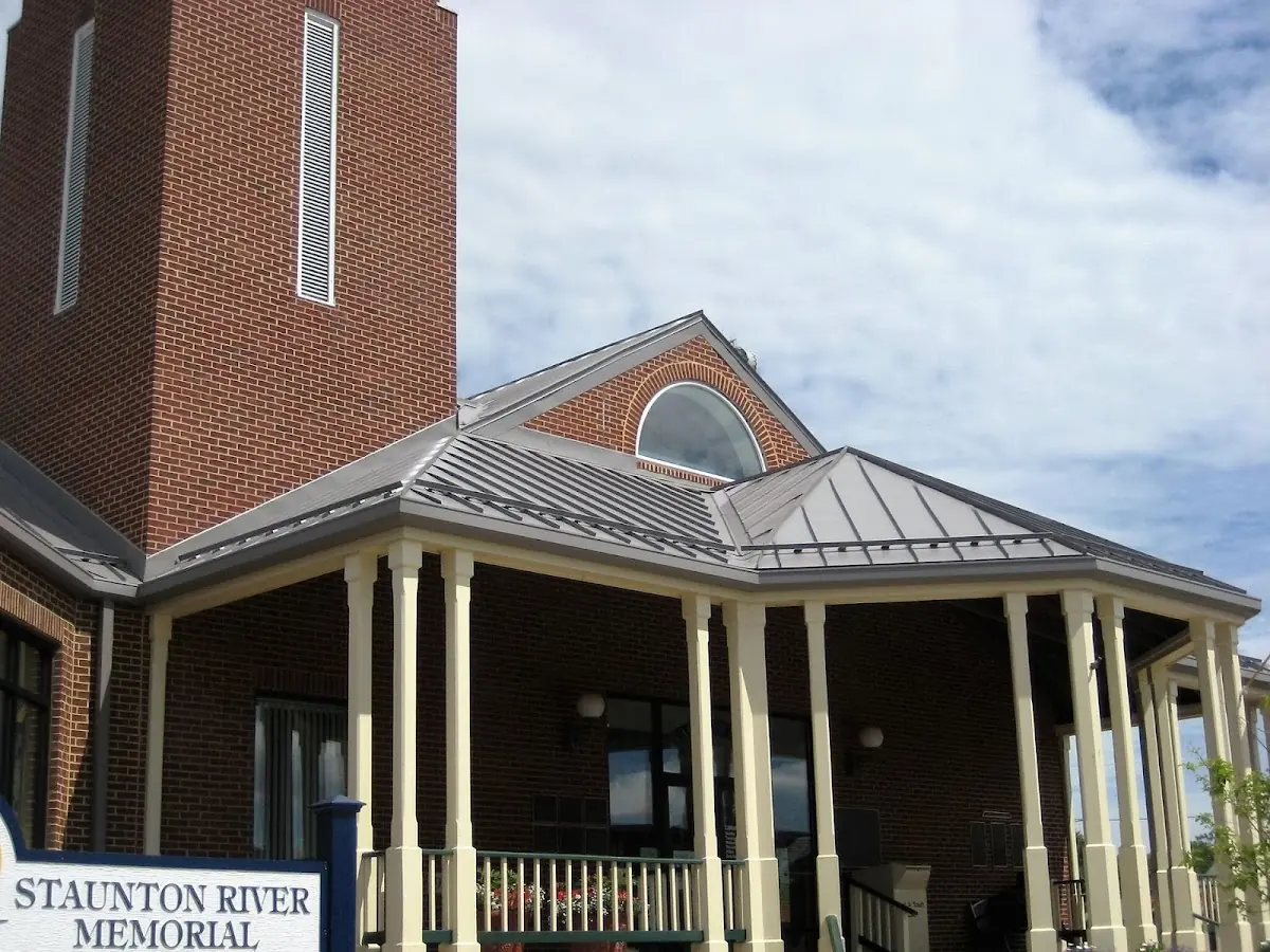 Skilled roofing craftsmen working on a residential roof in Naperville
